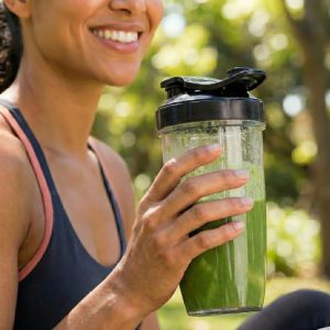 Woman with smoothie Nutri Blender